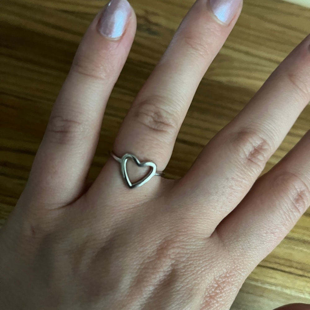 New silver tone heart shaped ring adjustable band one size fits most
